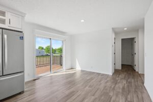 Dining area with sliding door to the deck in a new manufactured home at 11856 Danton Circle in Allendale, MI