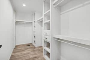 Walk-in closet with built-in shelving in a new manufactured home at 11856 Danton Circle in Allendale, MI