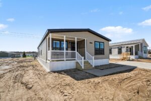Front exterior of a new manufactured home with covered porch at 4188 Shalimar Dr in Allendale, MI