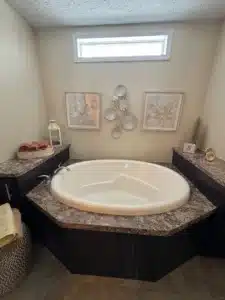 Garden tub with window in a pre-owned manufactured home at 4393 Twilight Way in Allendale, MI