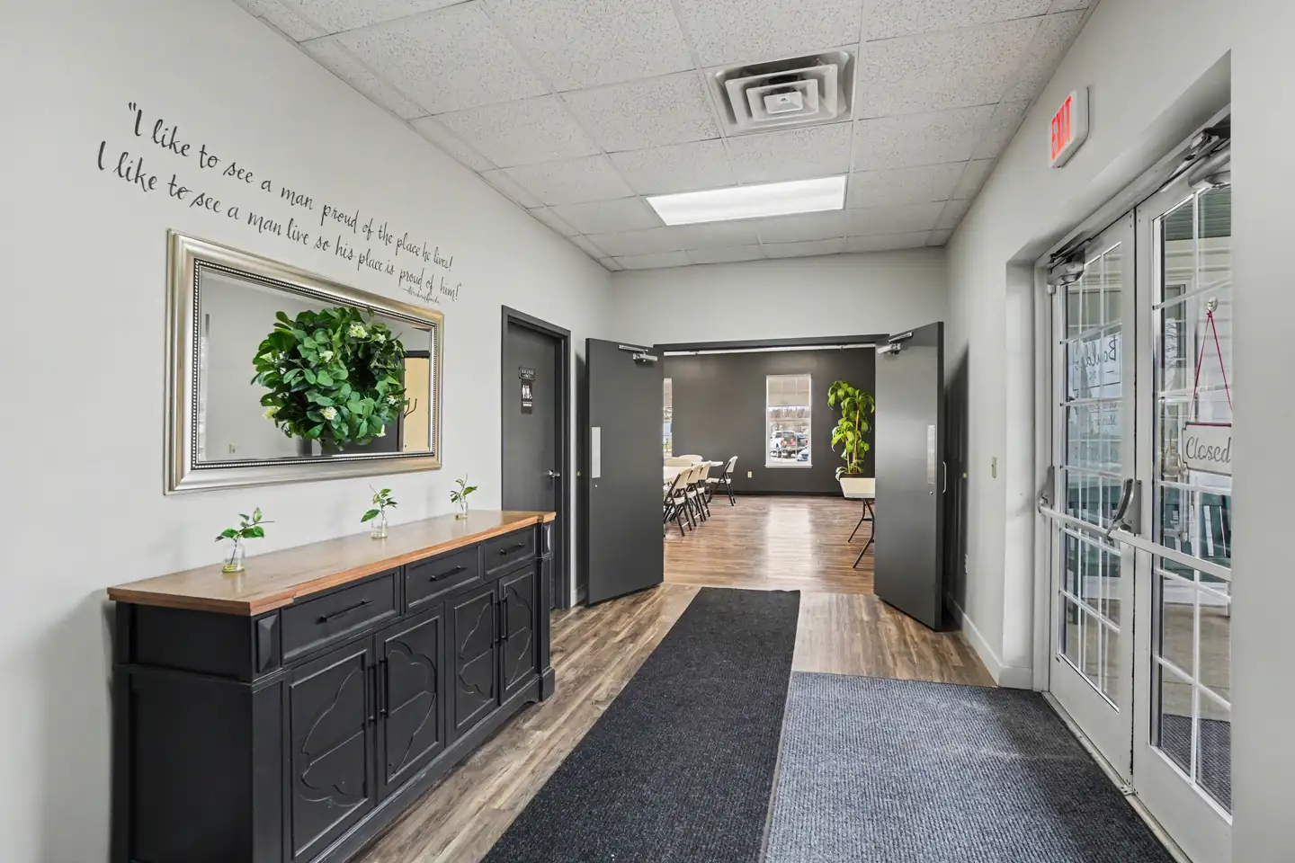 Clubhouse entry hall with welcome console at the manufactured home community in Allendale, MI