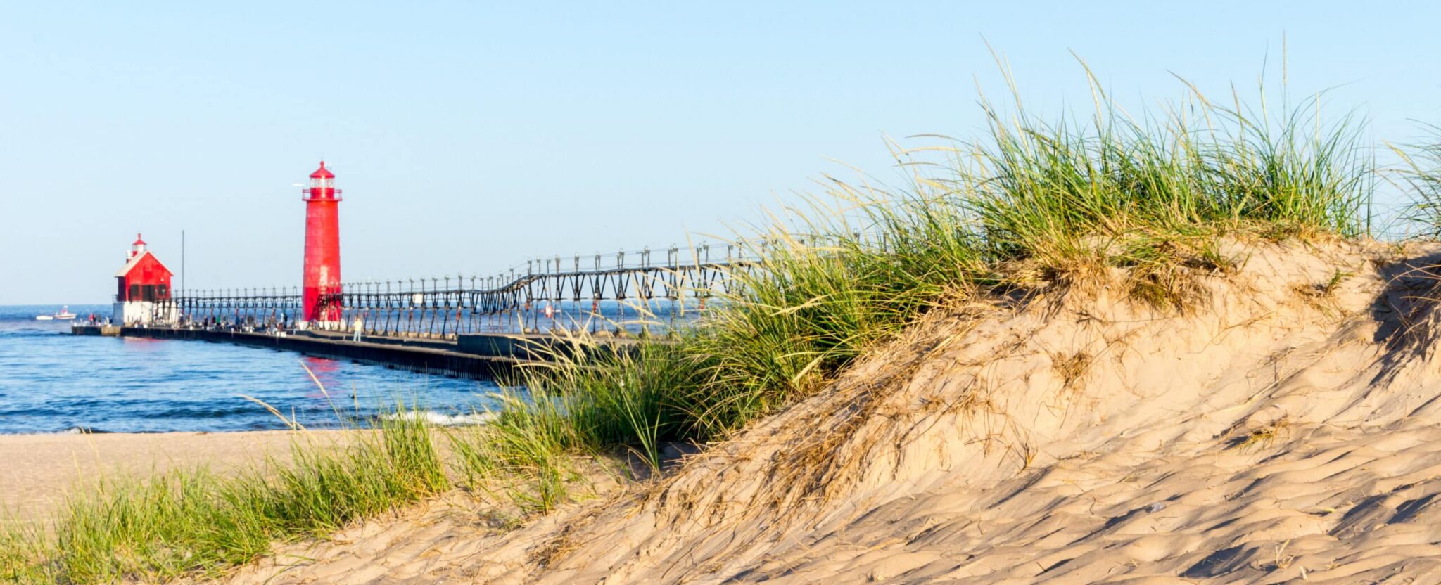 Grand Haven, Michigan lighthouse and pier seen from the dunes