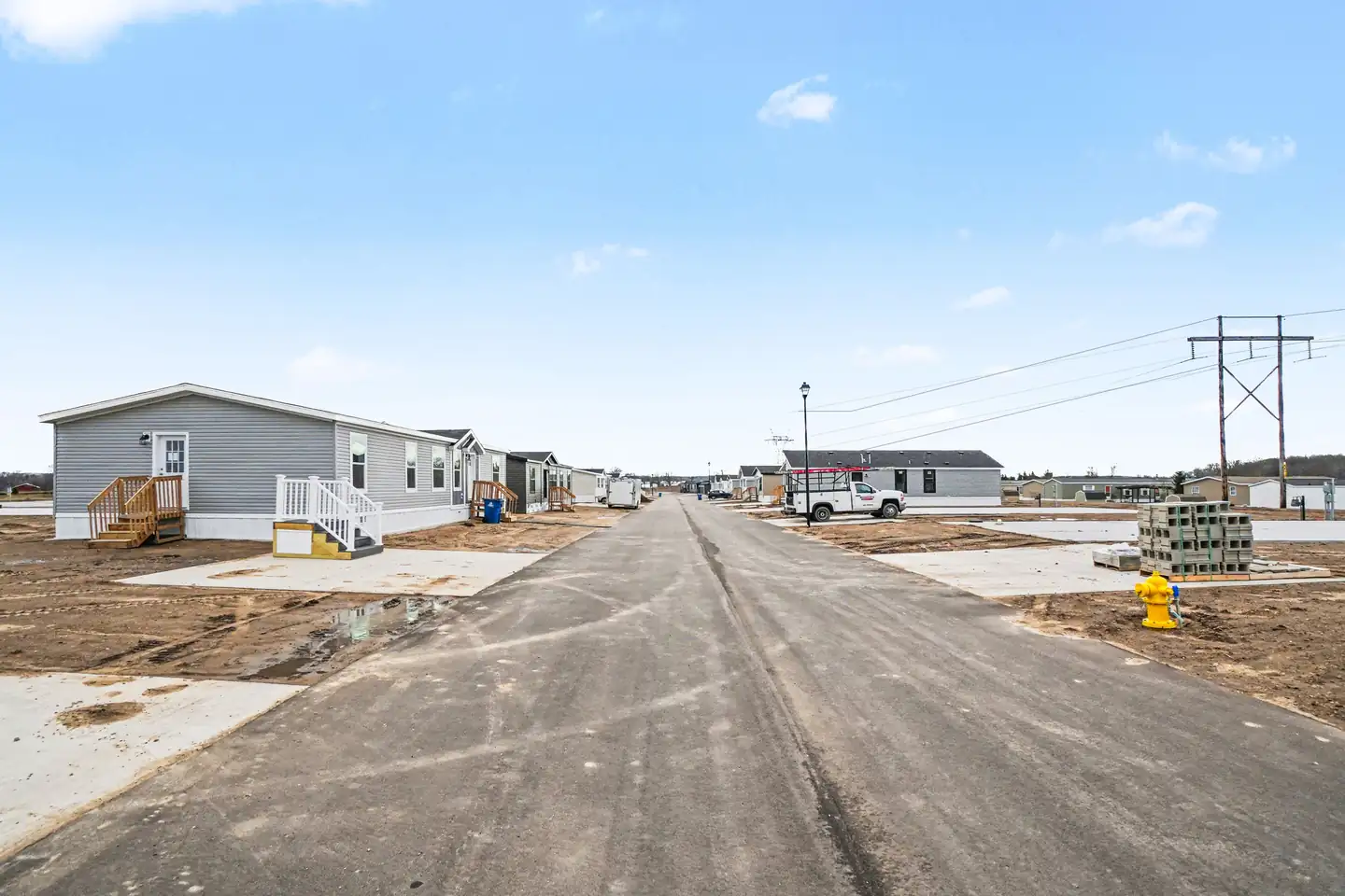 New home sites and street with manufactured homes being set in Allendale, MI