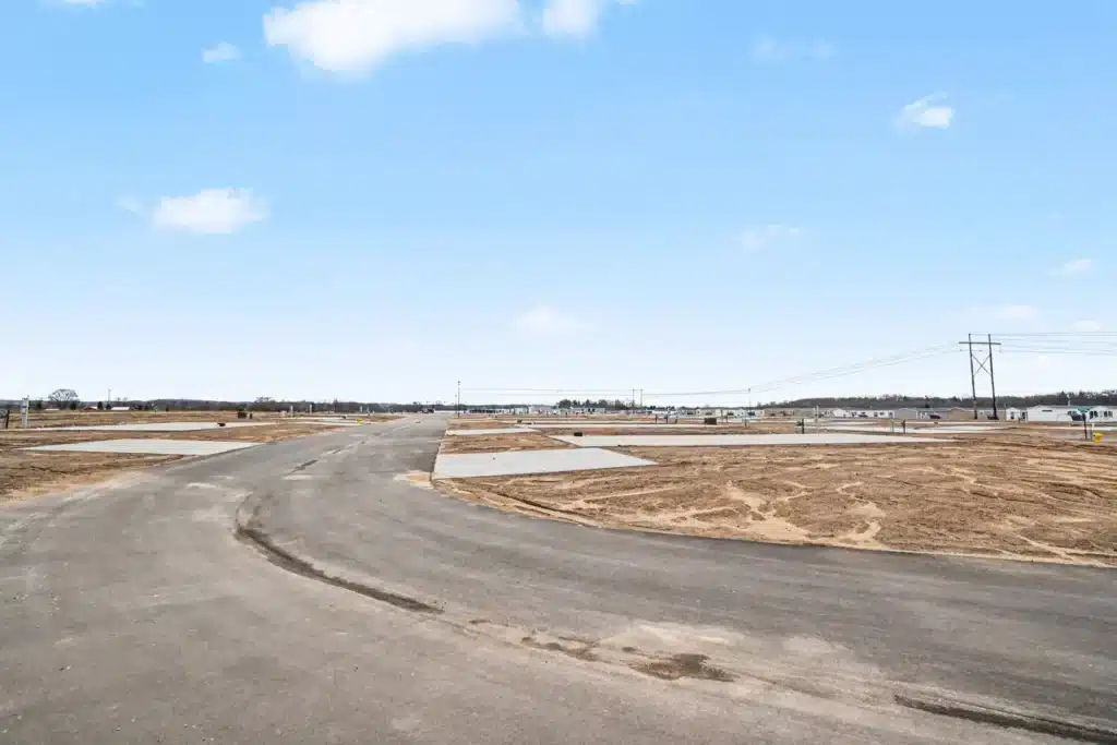 Newly paved street through the manufactured home community expansion in Allendale, MI