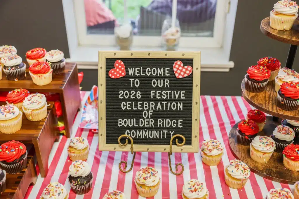 Welcome sign for the 2026 Festive Celebration surrounded by cupcakes in Allendale, MI