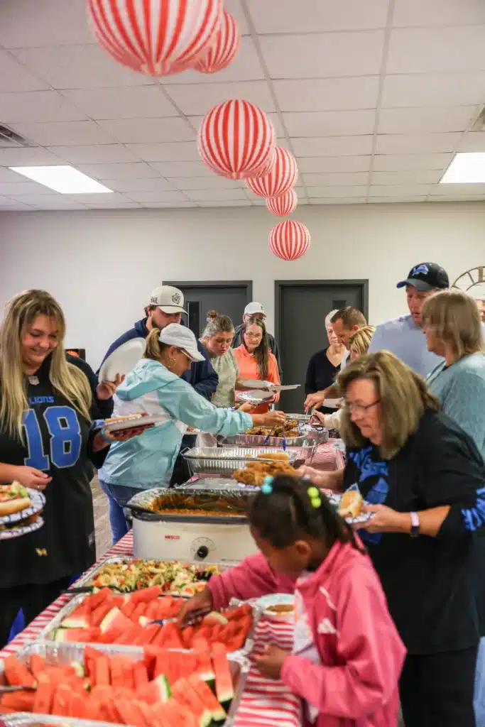 Residents filling their plates at the Festive Celebration buffet